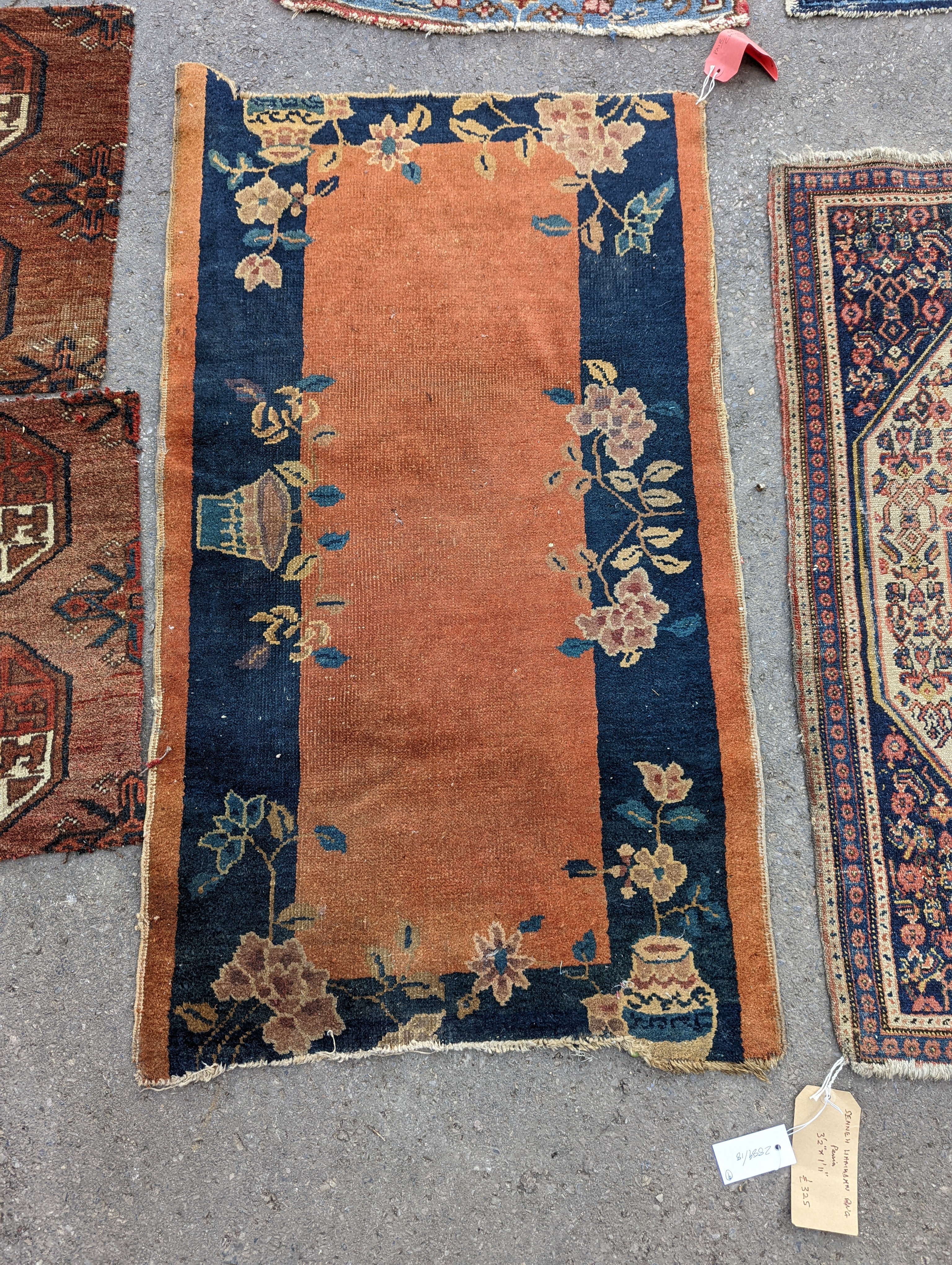 Nine Afghan, Persian and Chinese rug fragments.